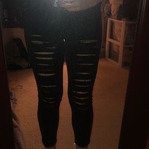 contemporary black ripped jeans